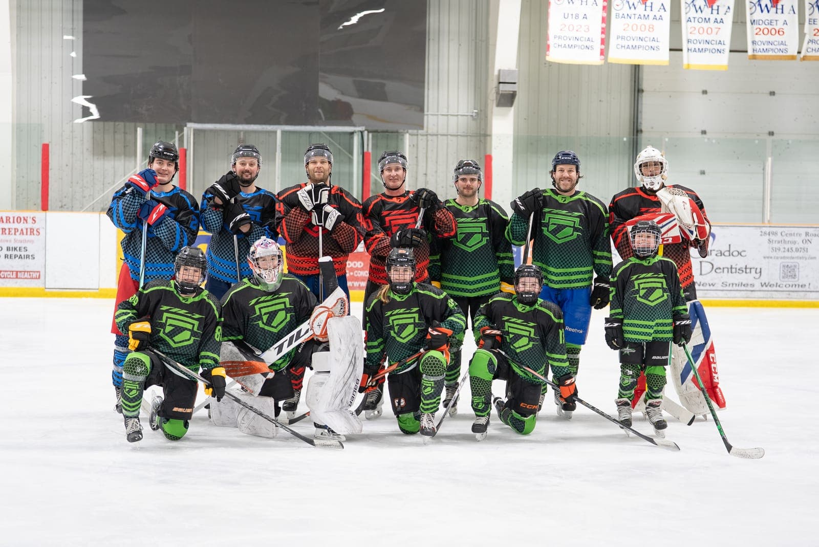 Tilt Hockey players on the ice with custom carbon fiber sticks